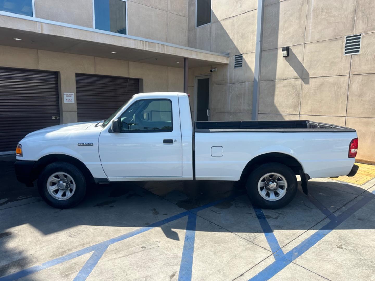 2011 WHITE /GRAY Ford Ranger XL 2WD (1FTKR1AE9BP) with an 4.0L V6 SOHC 12V engine, AUTOMATIC transmission, located at 30 S. Berkeley Avenue, Pasadena, CA, 91107, (626) 248-7567, 34.145447, -118.109398 - Body Style 2-Door REGULAR CAB PICKUP 2-DR Trim XL 2WD Engine 4.0L V6 SOHC 12V Other Transmission AUTOMATIC Drivetrain RWD Ext. Color WHITE Int. Color GRAY Stock Number 7662 VIN 1FTKR1AE9BPA78334 Location Crown City Motors Pasadena, CA WORK TRUCK!!! Crown City Motors is a use - Photo#1